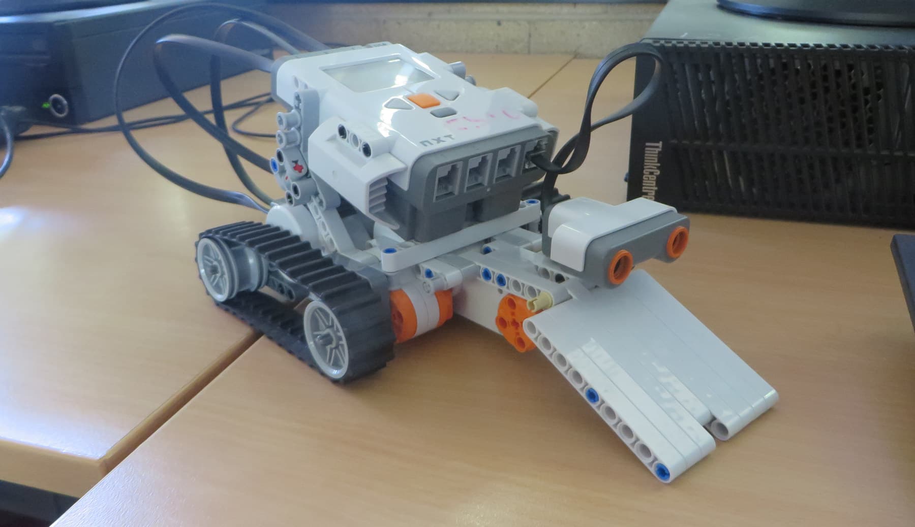 Close-up of a tracked Lego robotics system without identifiable people