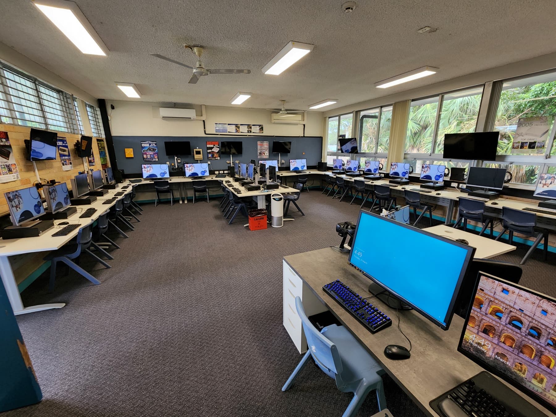 The same school computer room six days later with a complete working computer fleet