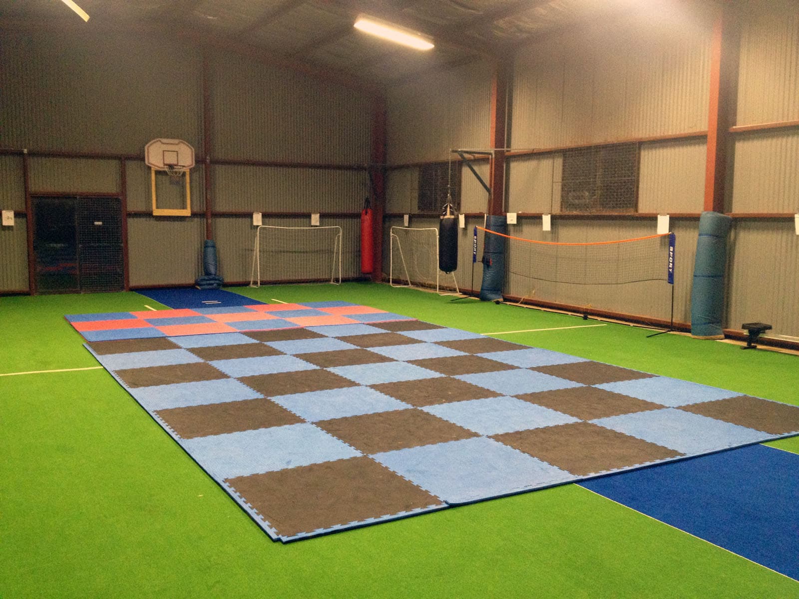 Empty Ivanhoe Youth Centre hall fitted for basketball, volleyball and flexible recreation