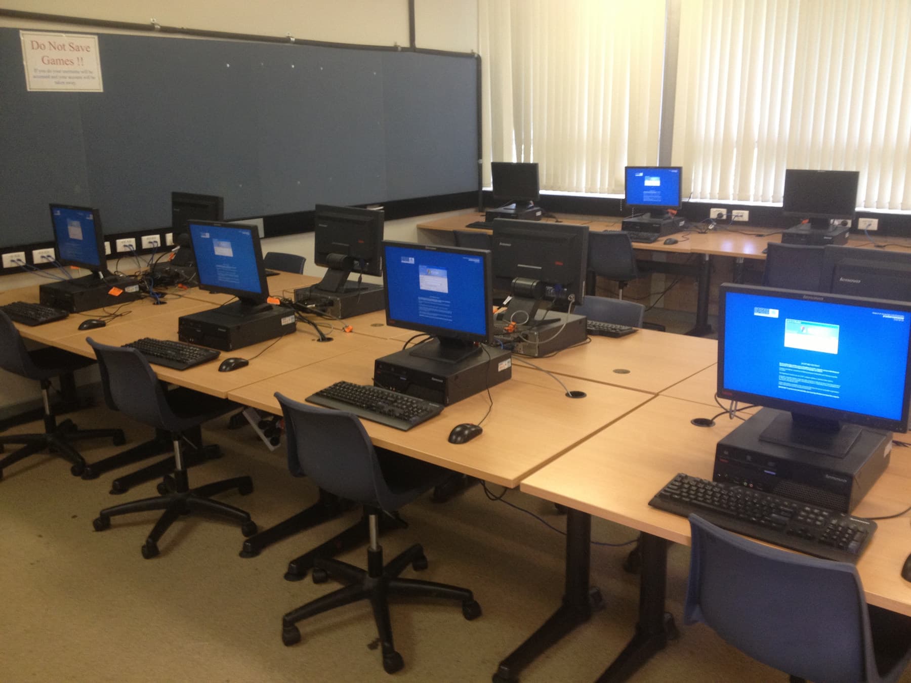 Empty school computer lab after a complete workstation deployment